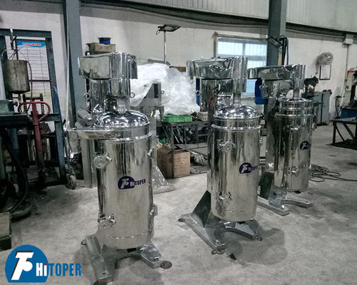 Tubular Centrifuge Designed for Three Phase Solid Liquid Separation and Clarification of Suspensions with Fine Solid Particles