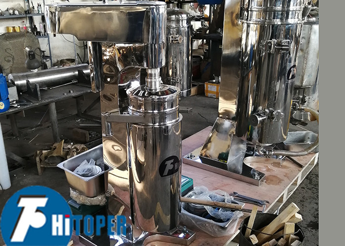 Continuous Operation Tubular Centrifuge for Clarifying Liquids Containing Fine Solids and Achieving High Separation Efficiency and Capacity
